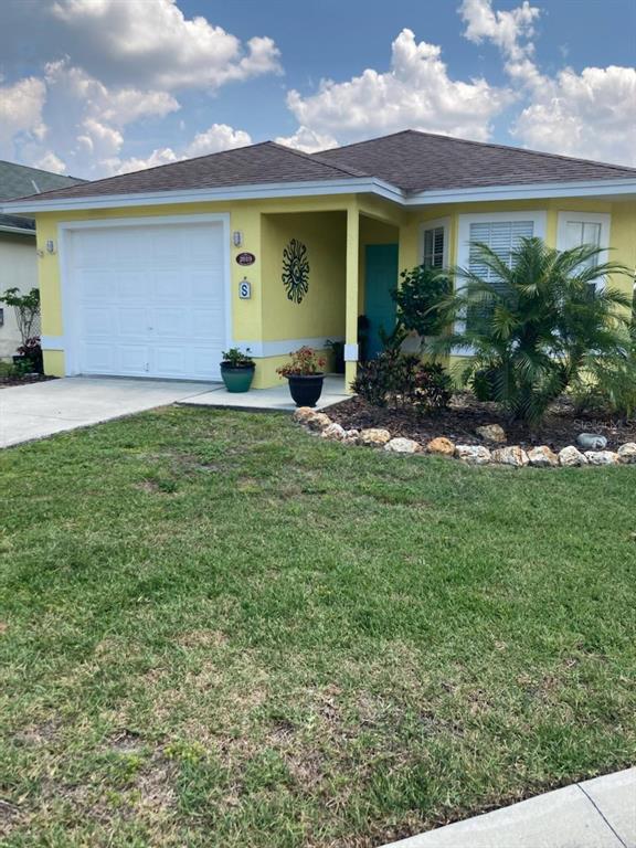 2019 Hatteras Point Lakeland, FL 33813 - Photo 1 of 1 a front view of house with yard