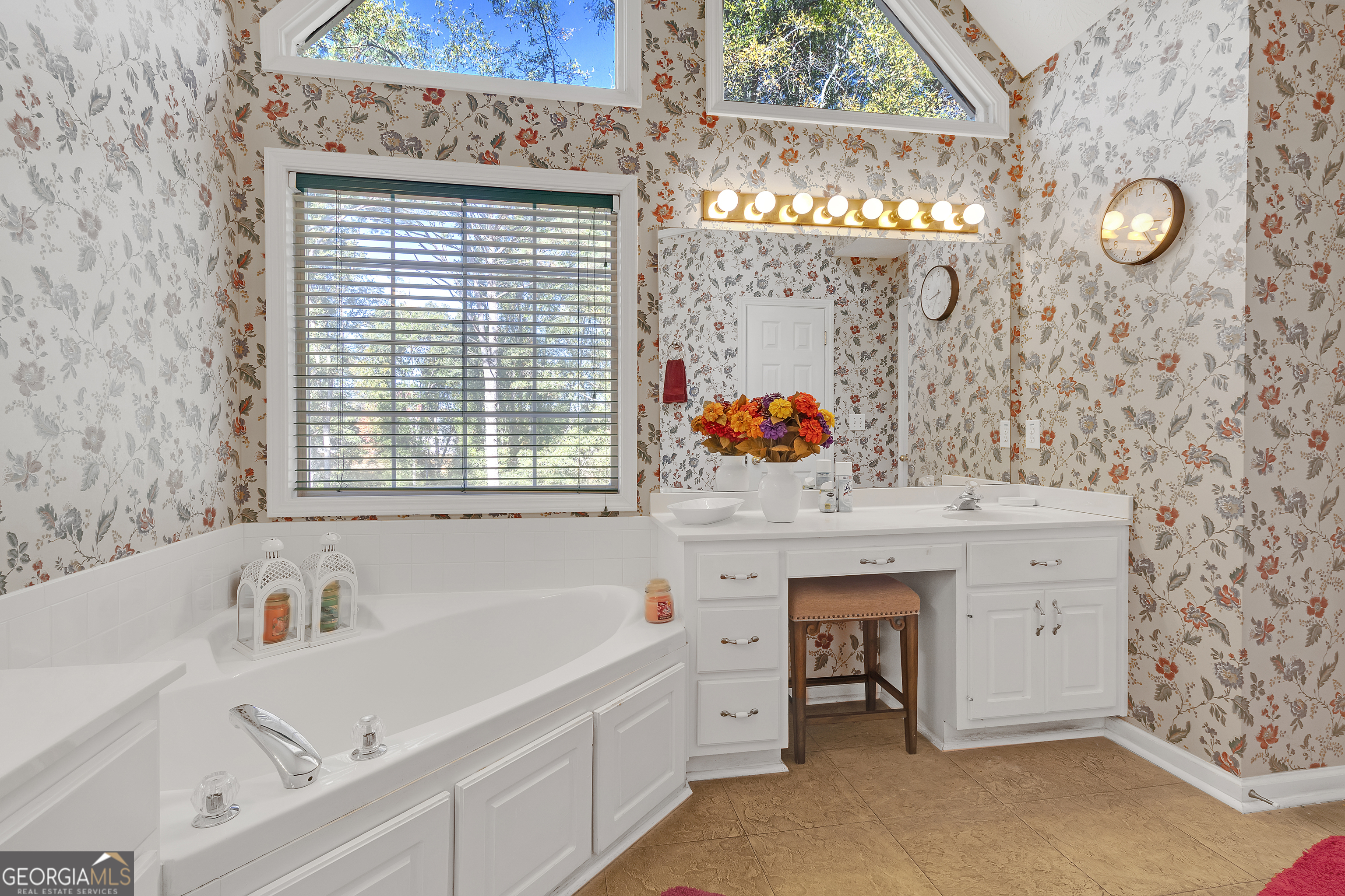 2215 Brandon Lane Southwest Conyers, GA 30094 - Photo 21 of 31 a bathroom with a sink and a bathtub