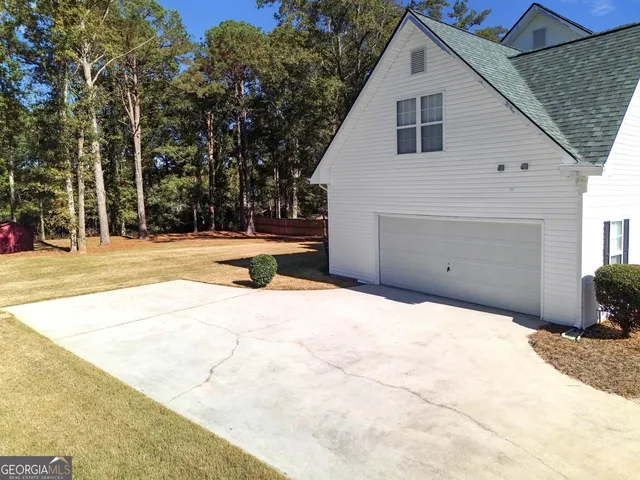 a view of backyard of house