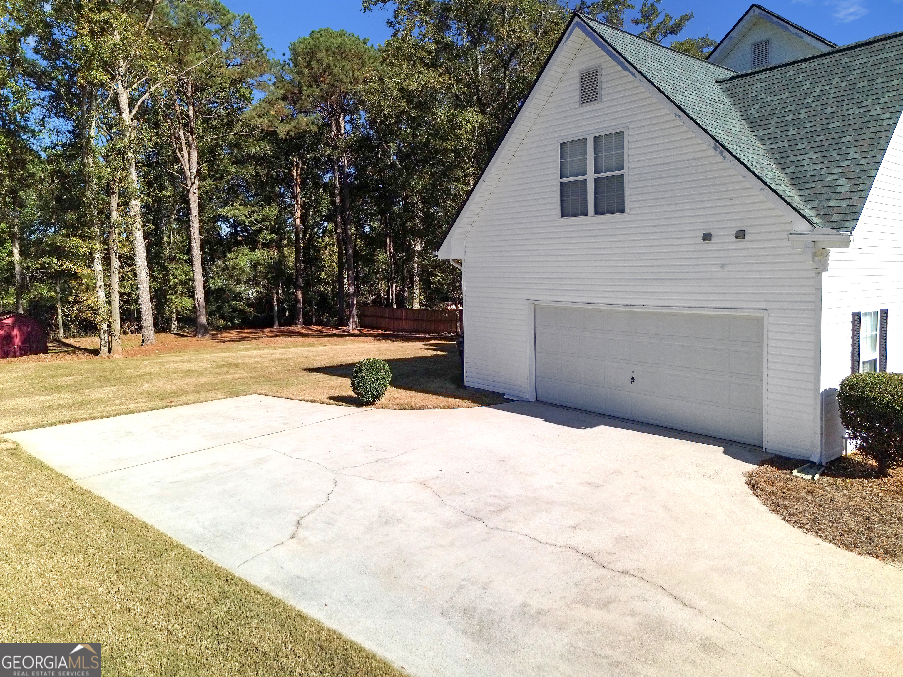 2215 Brandon Lane Southwest Conyers, GA 30094 - Photo 5 of 31 a view of backyard of house