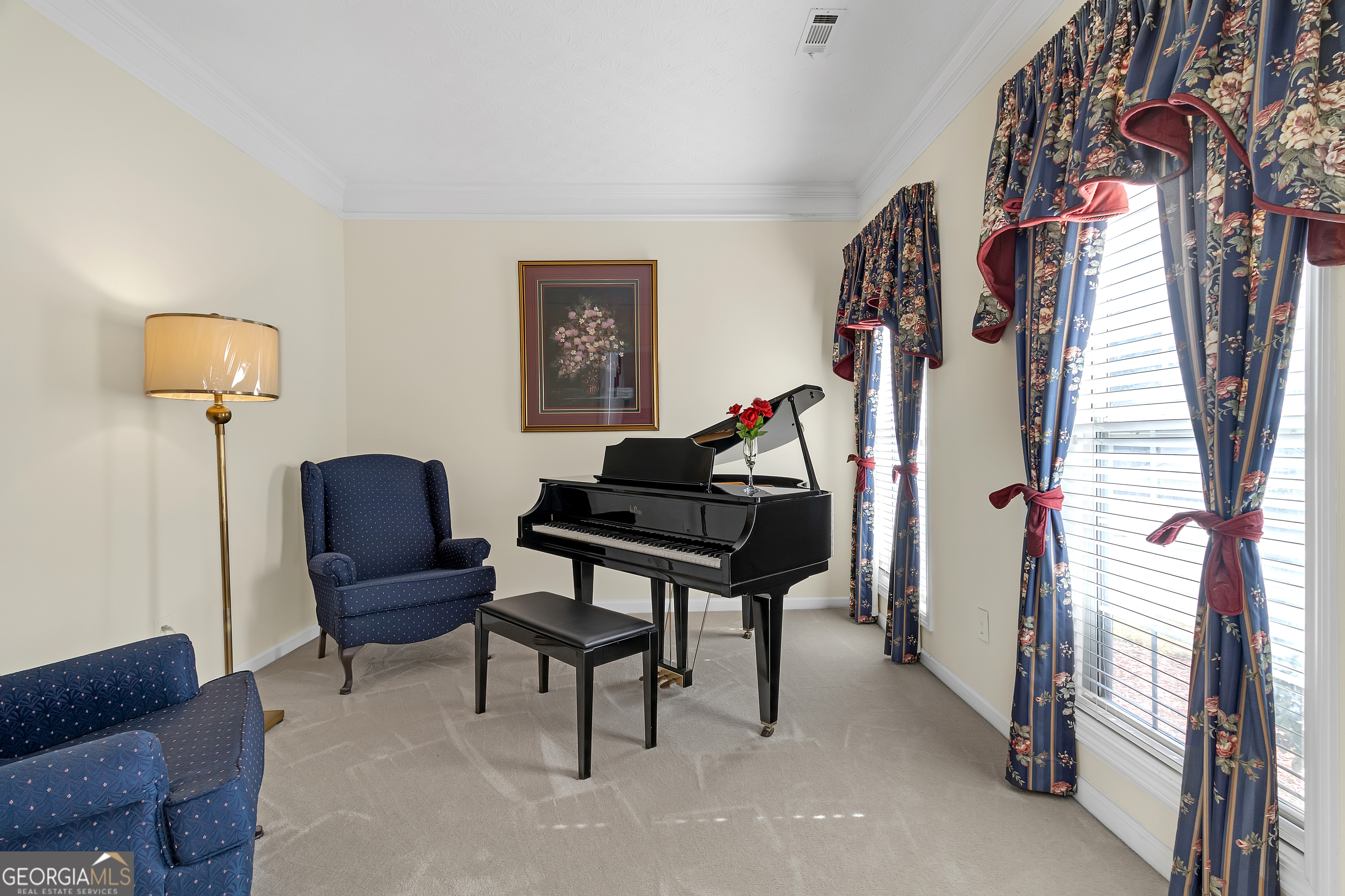 2215 Brandon Lane Southwest Conyers, GA 30094 - Photo 10 of 31 a living room with furniture and a lamp