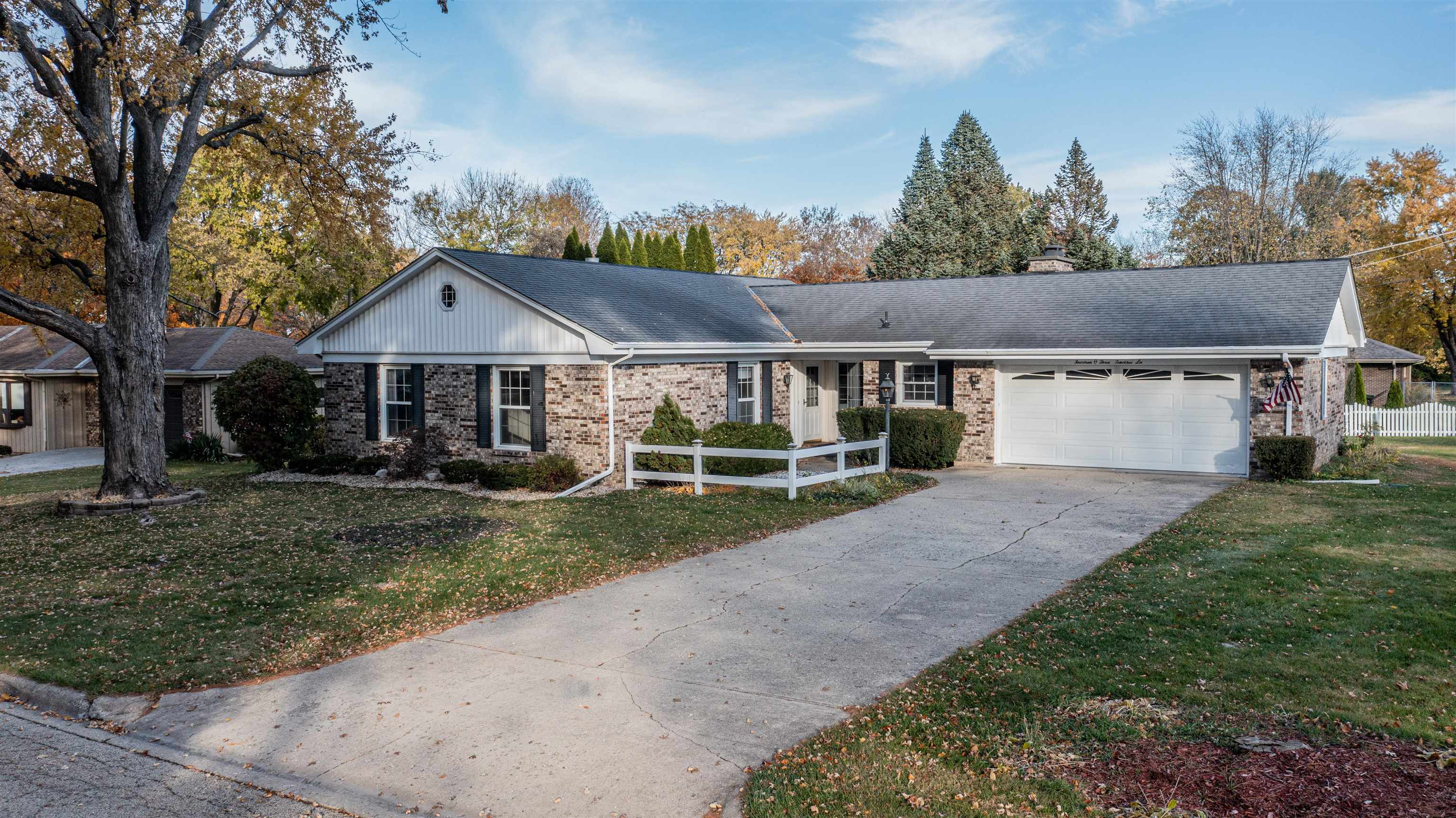 1403 Timothee Lane Mendota, IL 61342 - Photo 22 of 29 a view of a house with yard and a garden
