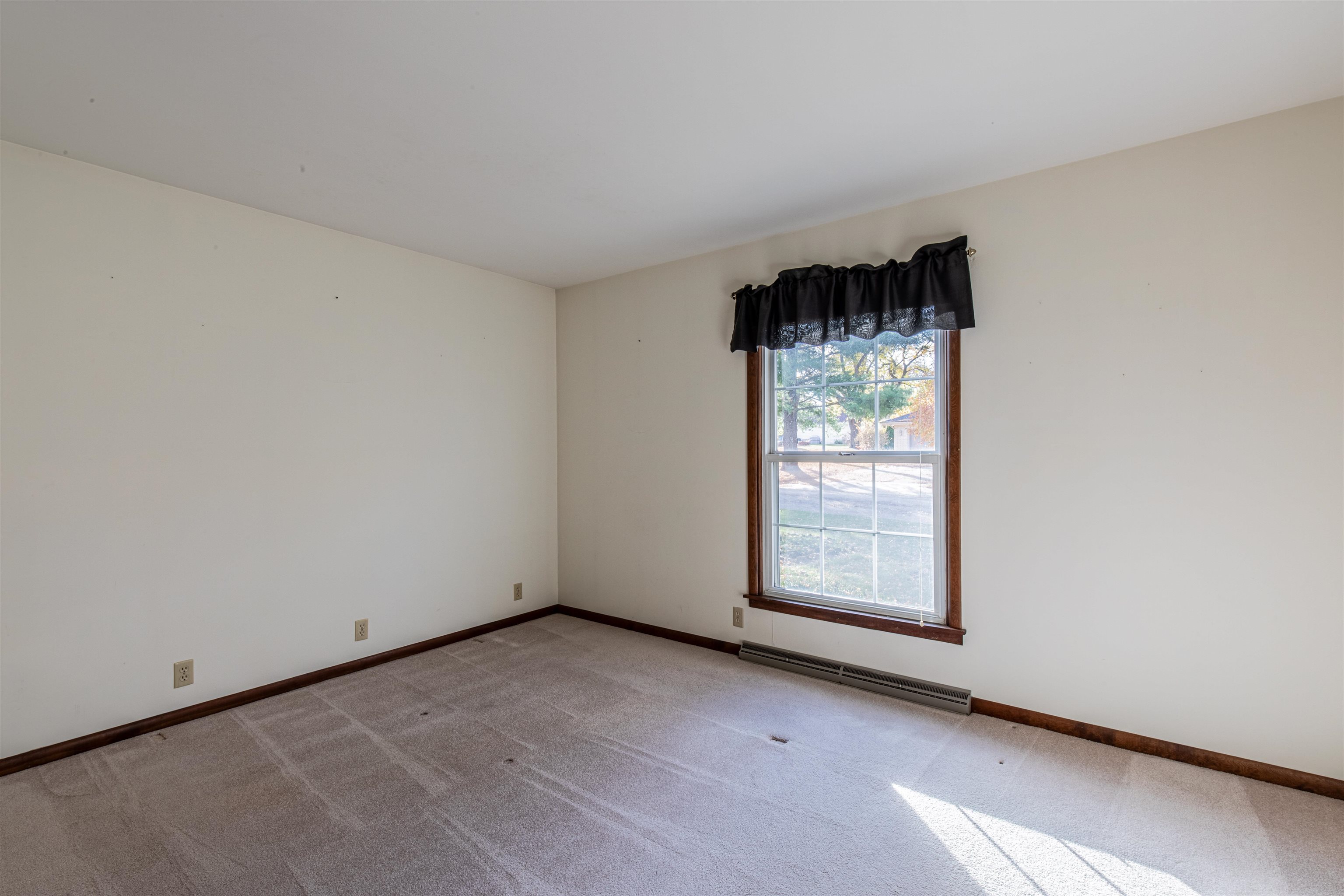 1403 Timothee Lane Mendota, IL 61342 - Photo 9 of 29 an empty room with a window