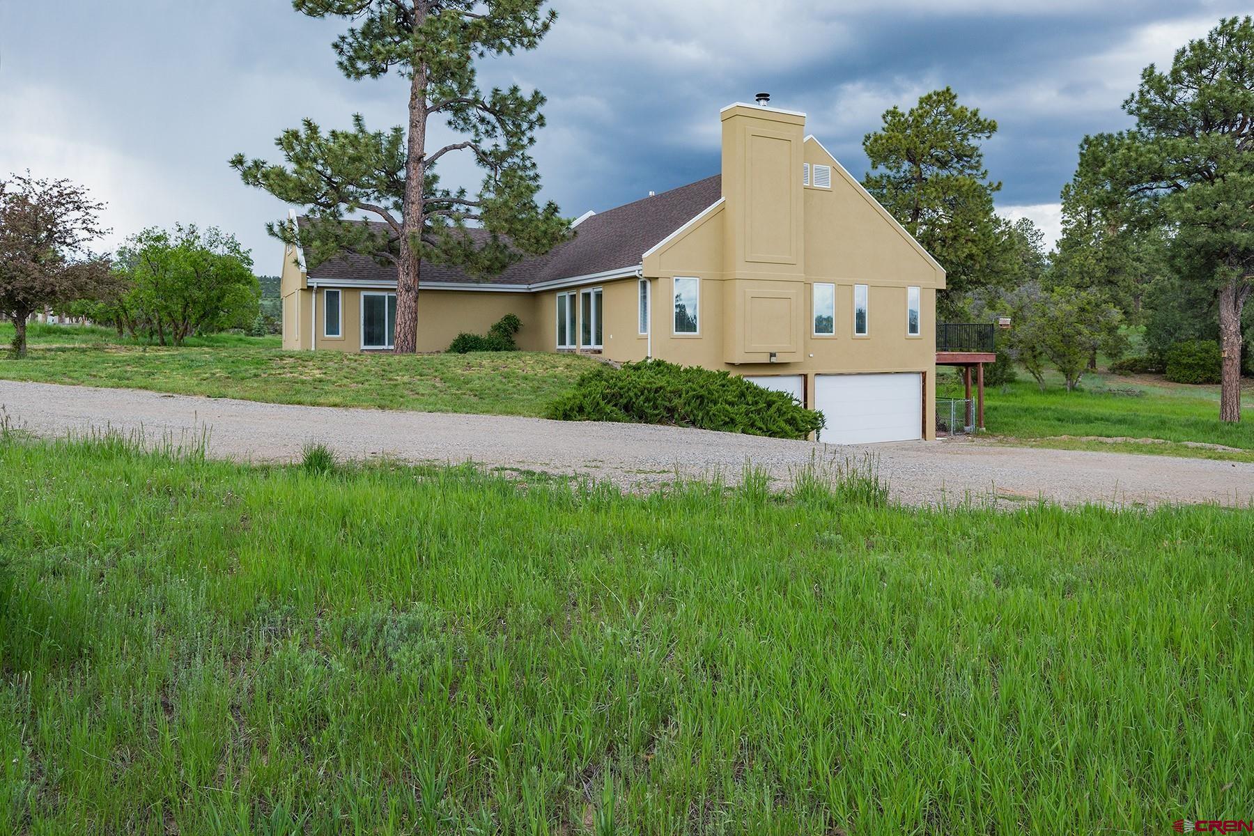85 Blue Ridge Hesperus, CO 81326 - Photo 3 of 33 a front view of house with yard and green space