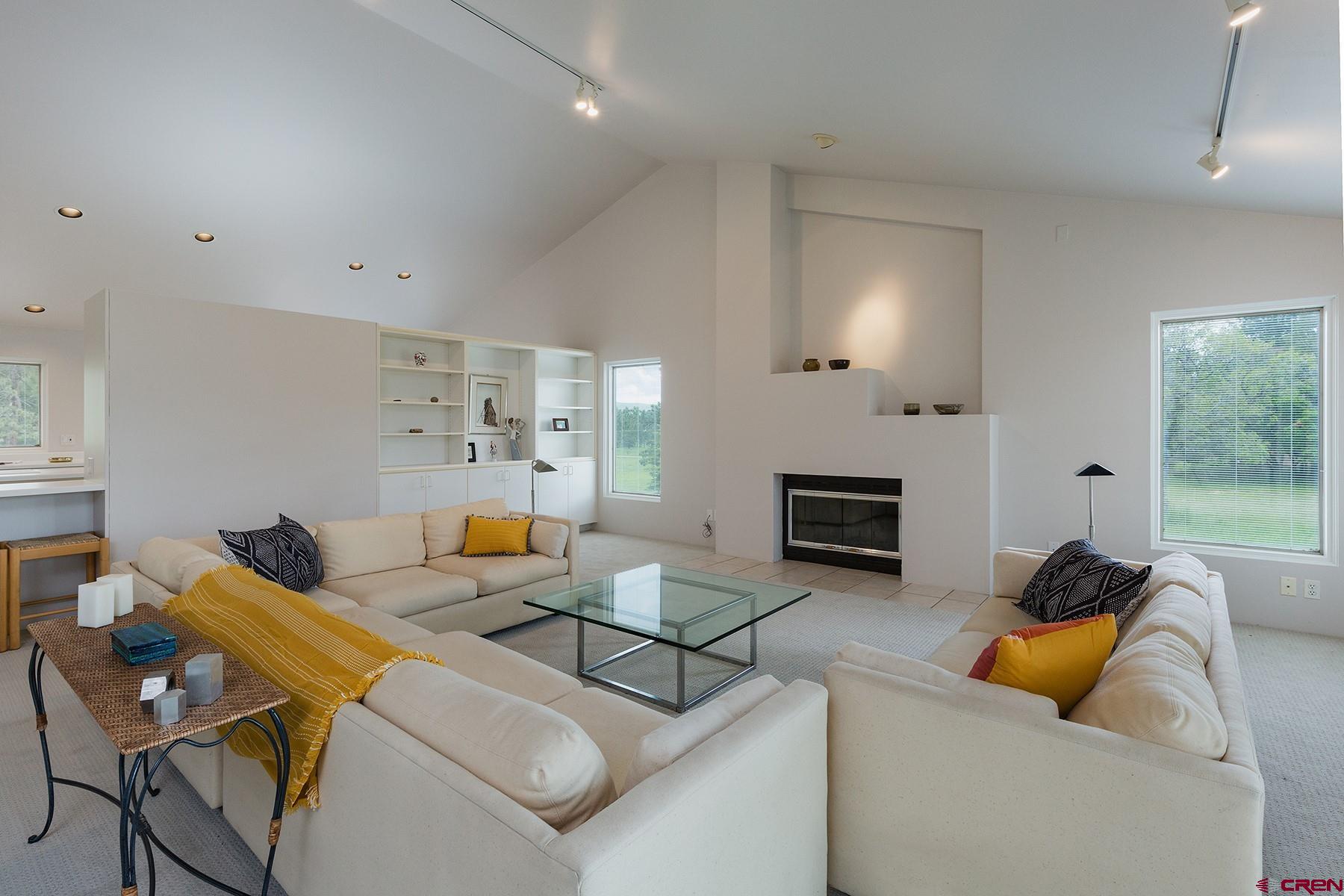 85 Blue Ridge Hesperus, CO 81326 - Photo 7 of 33 a living room with furniture and a fireplace