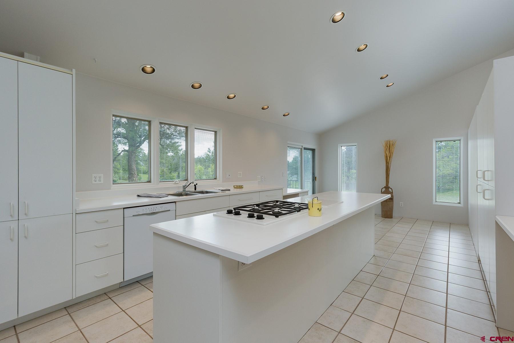 85 Blue Ridge Hesperus, CO 81326 - Photo 9 of 33 a kitchen with a sink and cabinets