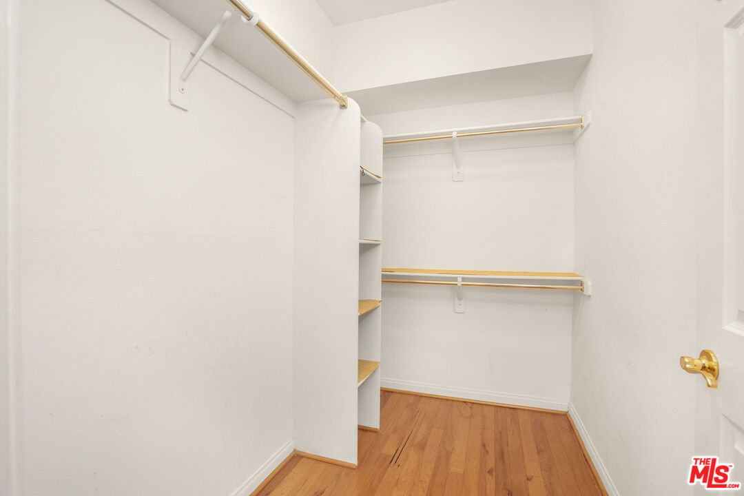 1128 West Duarte Road, Unit A Arcadia, CA 91007 - Photo 18 of 28 a view of walk in closet with empty racks