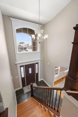 a view of a hallway view with staircase