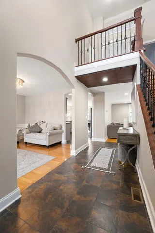 a view of livingroom with furniture and staircase