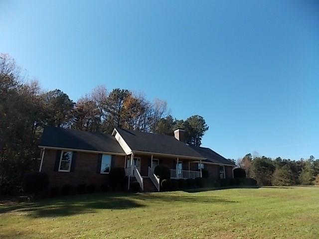 1141 Harbins Road Dacula, GA 30019 - Photo 1 of 1 Gorgeous Dacula Ranch conveniently located just minutes from Highway 316. Your own private piece of paradise!