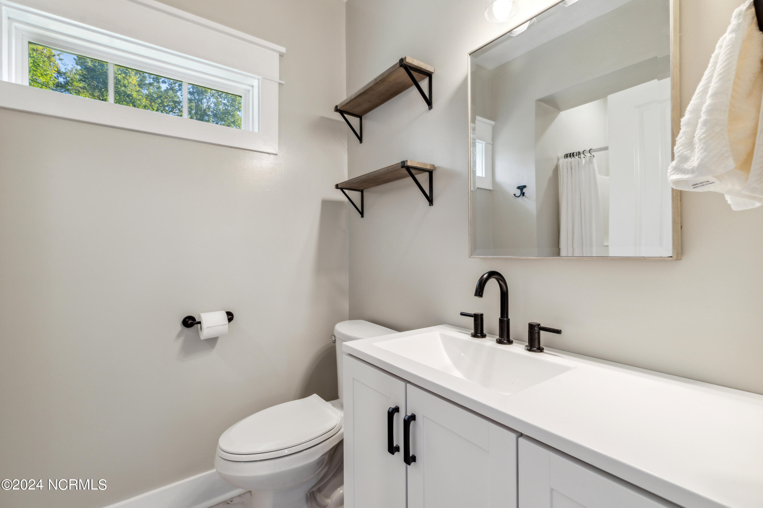 2923 Ash Little River Road Northwest Ash, NC 28420 - Photo 27 of 44 Primary Bathroom