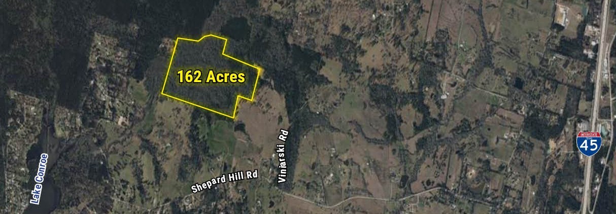 24 Lindley Survey Abstract Willis, TX 77318 - Photo 3 of 4 a sign that is on a pole