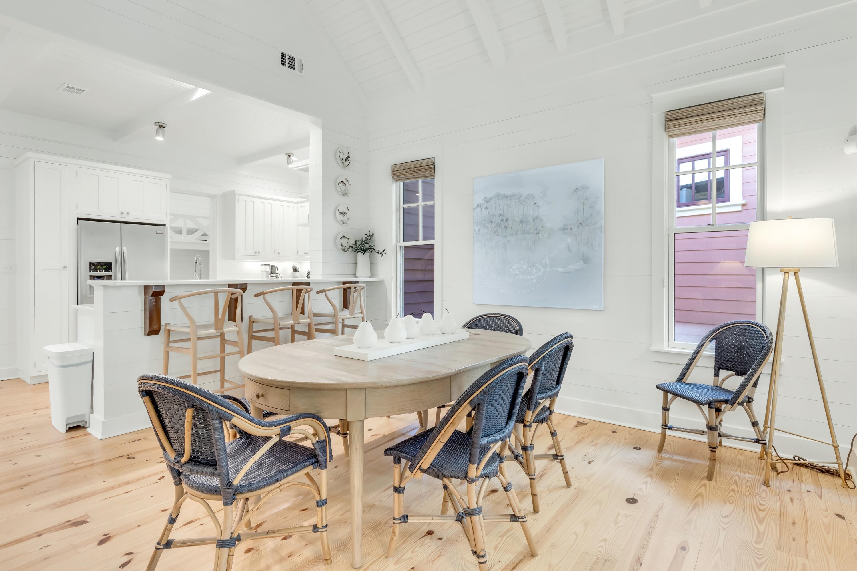 114 Sunset Ridge Lane Santa Rosa Beach, FL 32459 - Photo 12 of 90 a view of a dining room with furniture and wooden floor