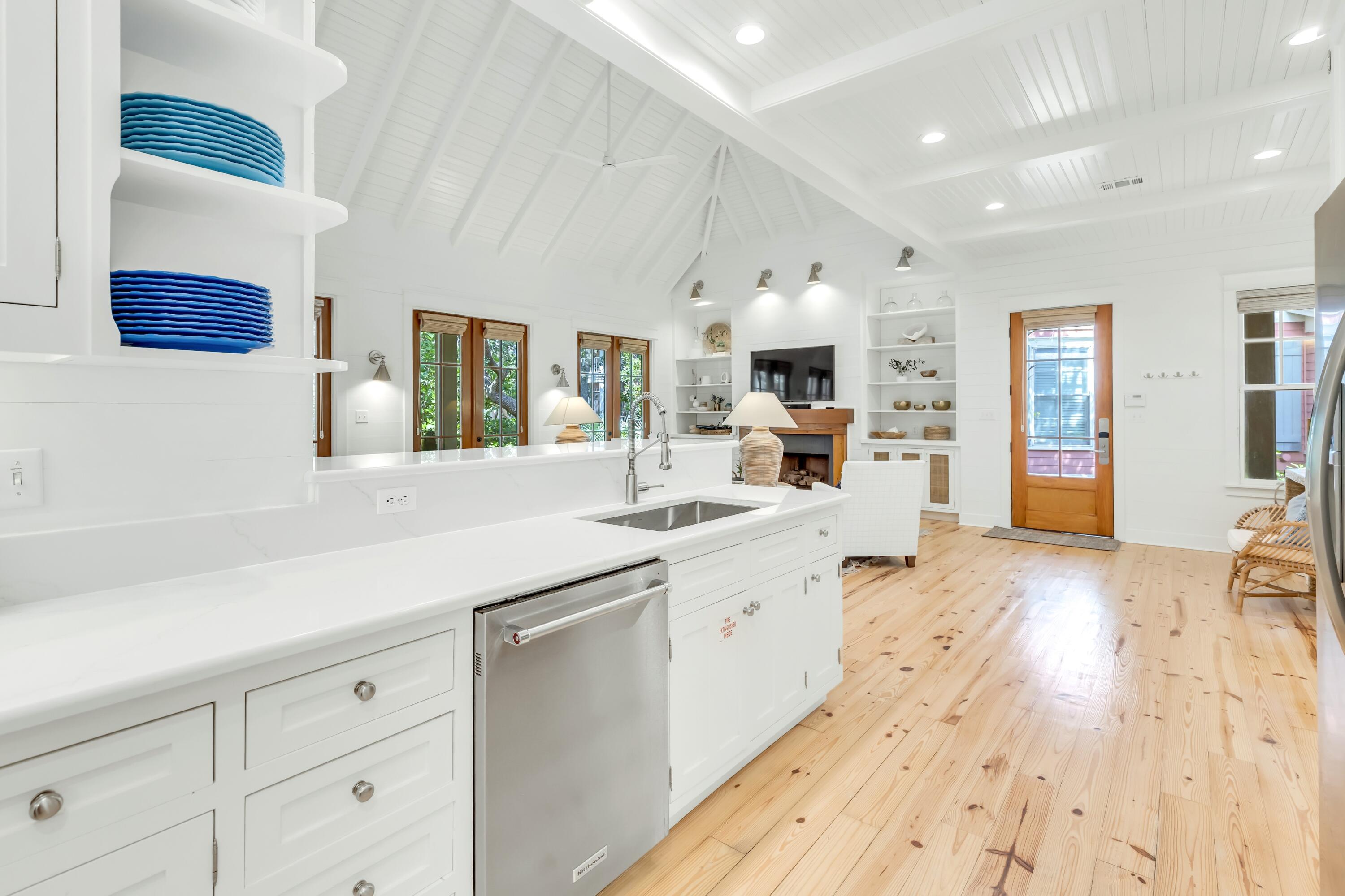114 Sunset Ridge Lane Santa Rosa Beach, FL 32459 - Photo 17 of 90 a large kitchen with a sink and cabinets