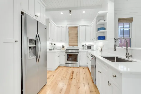 a bedroom with furniture and flat screen tv