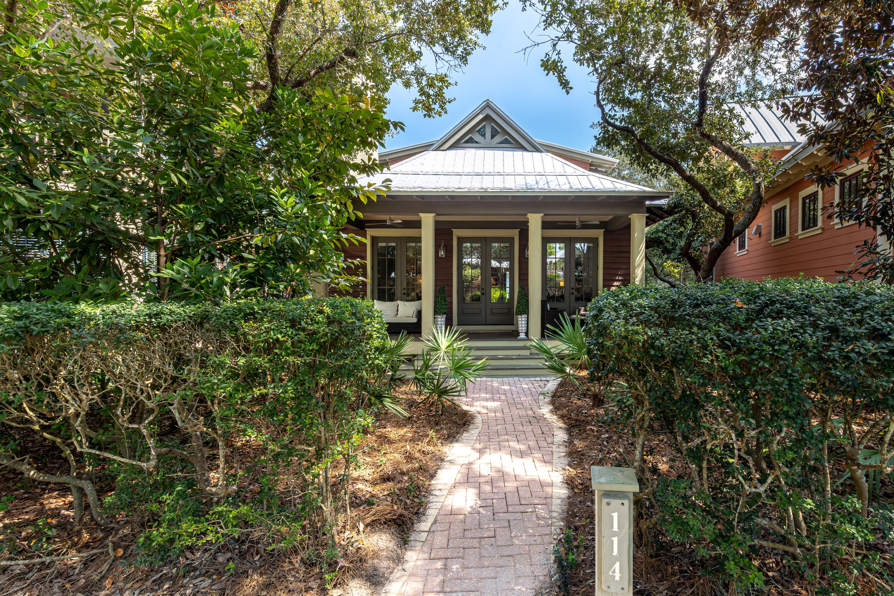 114 Sunset Ridge Lane Santa Rosa Beach, FL 32459 - Photo 32 of 90 a front view of a house with garden