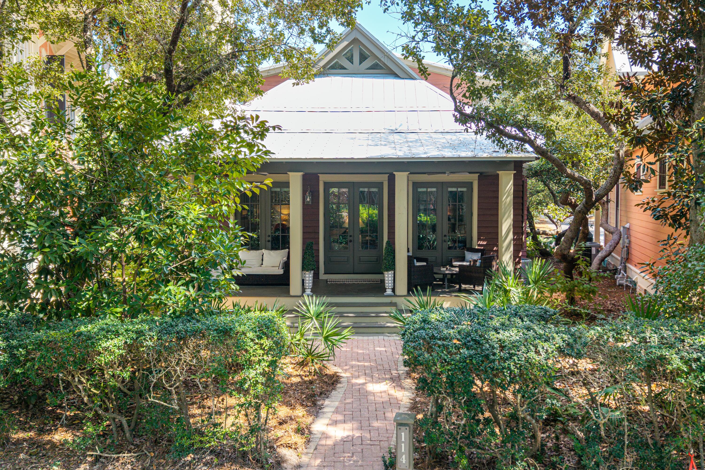 114 Sunset Ridge Lane Santa Rosa Beach, FL 32459 - Photo 33 of 90 a front view of a house with garden