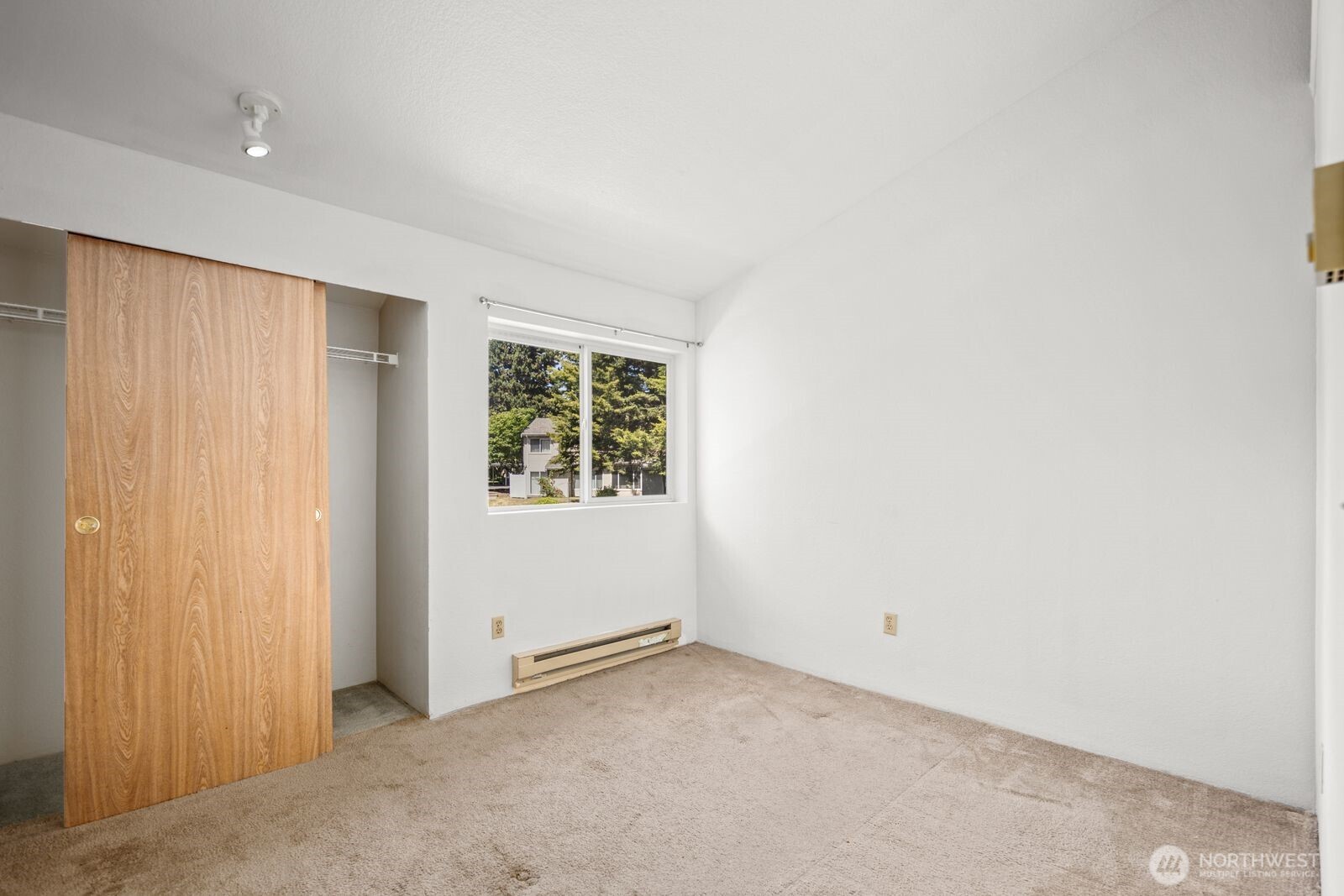 2100 South 336th Street, Unit G3 Federal Way, WA 98003 - Photo 13 of 27 an empty room with windows