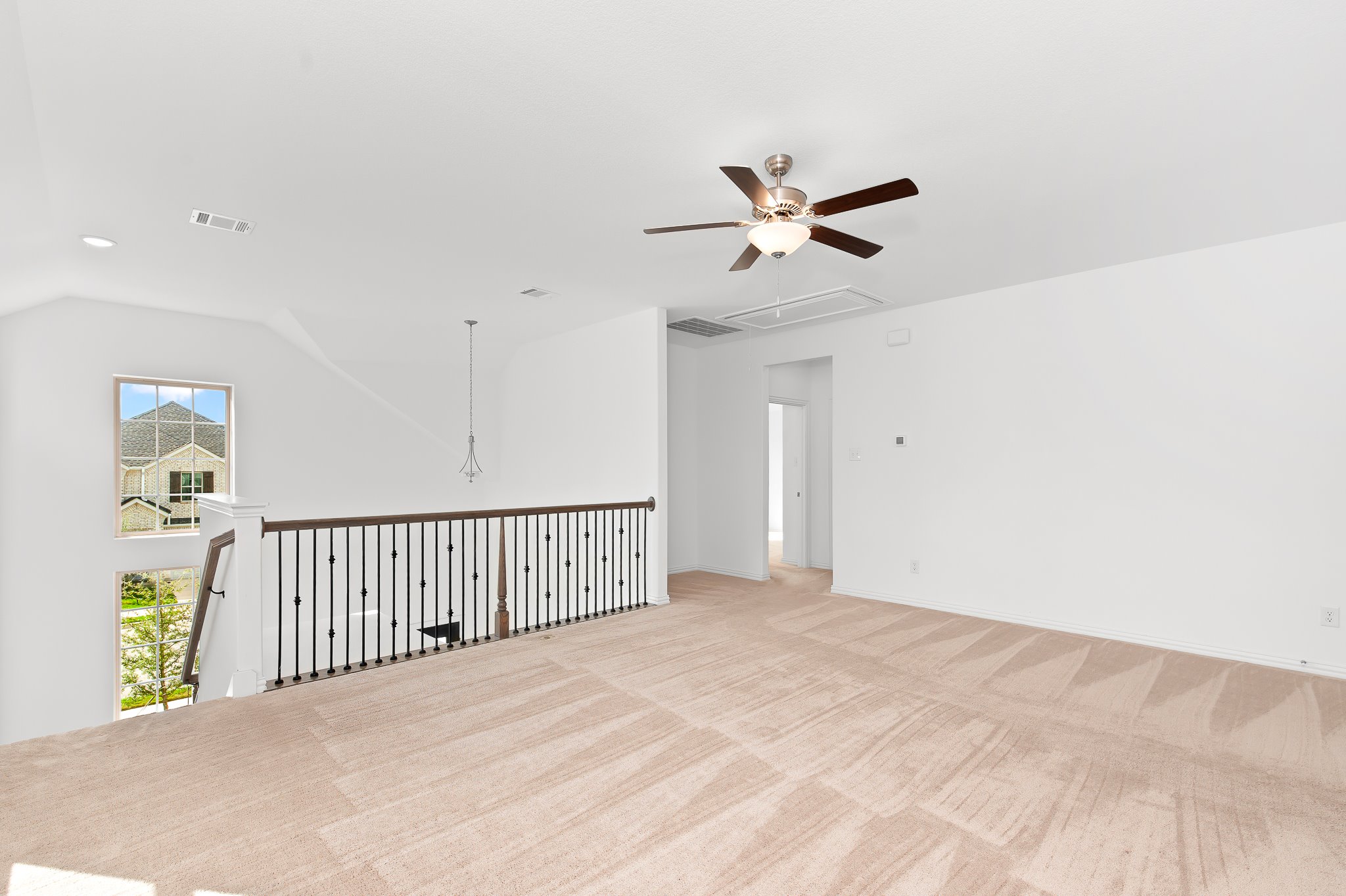 1128 Ridge Runner Drive Georgetown, TX 78628 - Photo 23 of 40 Unfurnished room featuring ceiling fan and light carpet