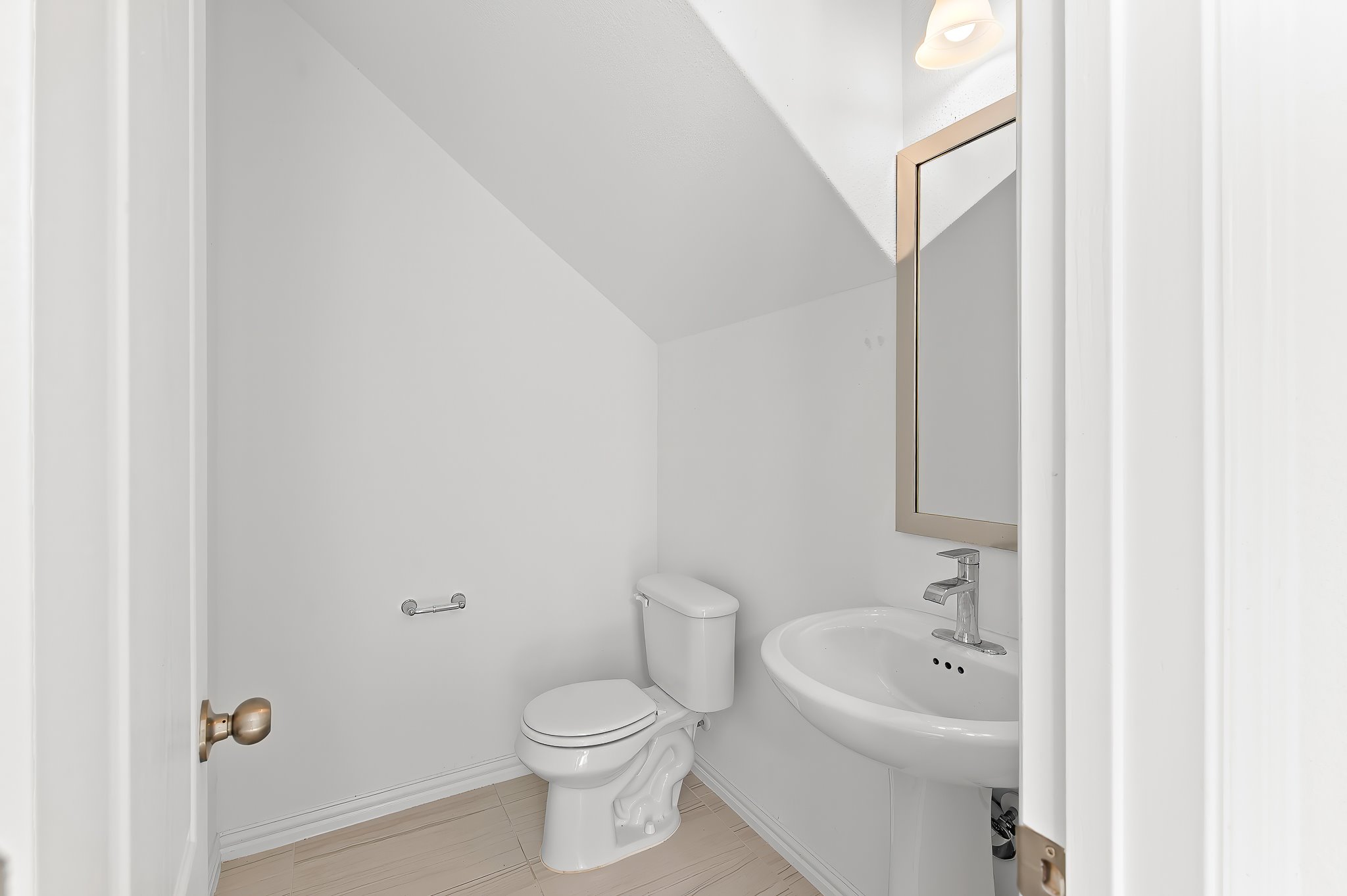 1128 Ridge Runner Drive Georgetown, TX 78628 - Photo 6 of 40 Half bathroom featuring lofted ceiling and toilet