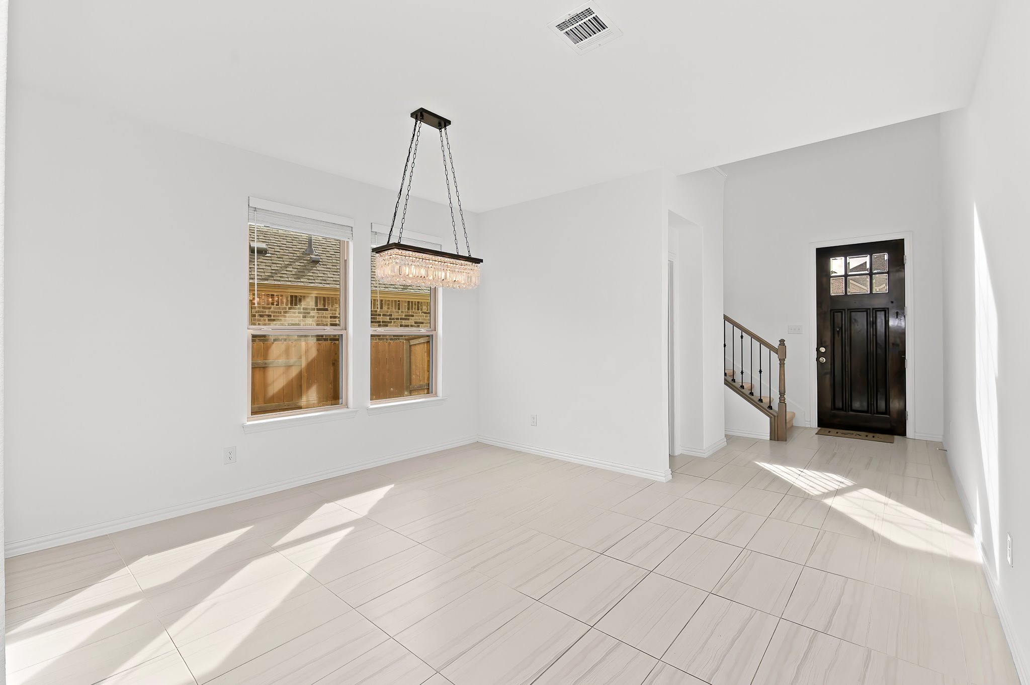 1128 Ridge Runner Drive Georgetown, TX 78628 - Photo 8 of 40 Entrance foyer with light tile patterned flooring