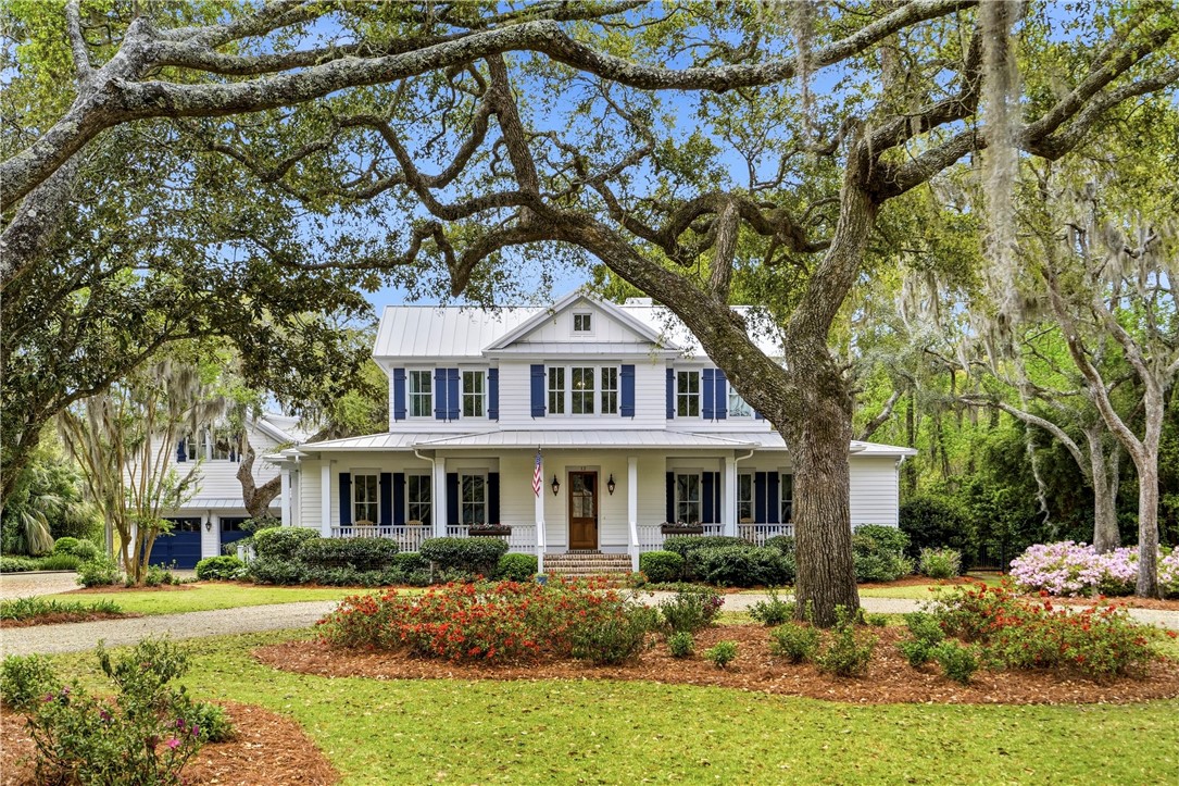 12 Tanglewood Road St. Simons Island, GA 31522 - Photo 1 of 65 Front Elevation with garage in background