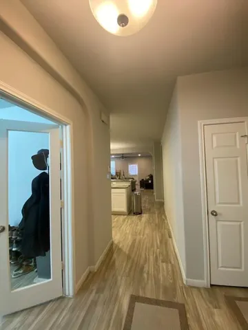 a view of a living room hardwood