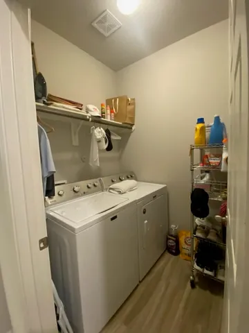 a utility room with dryer and washer