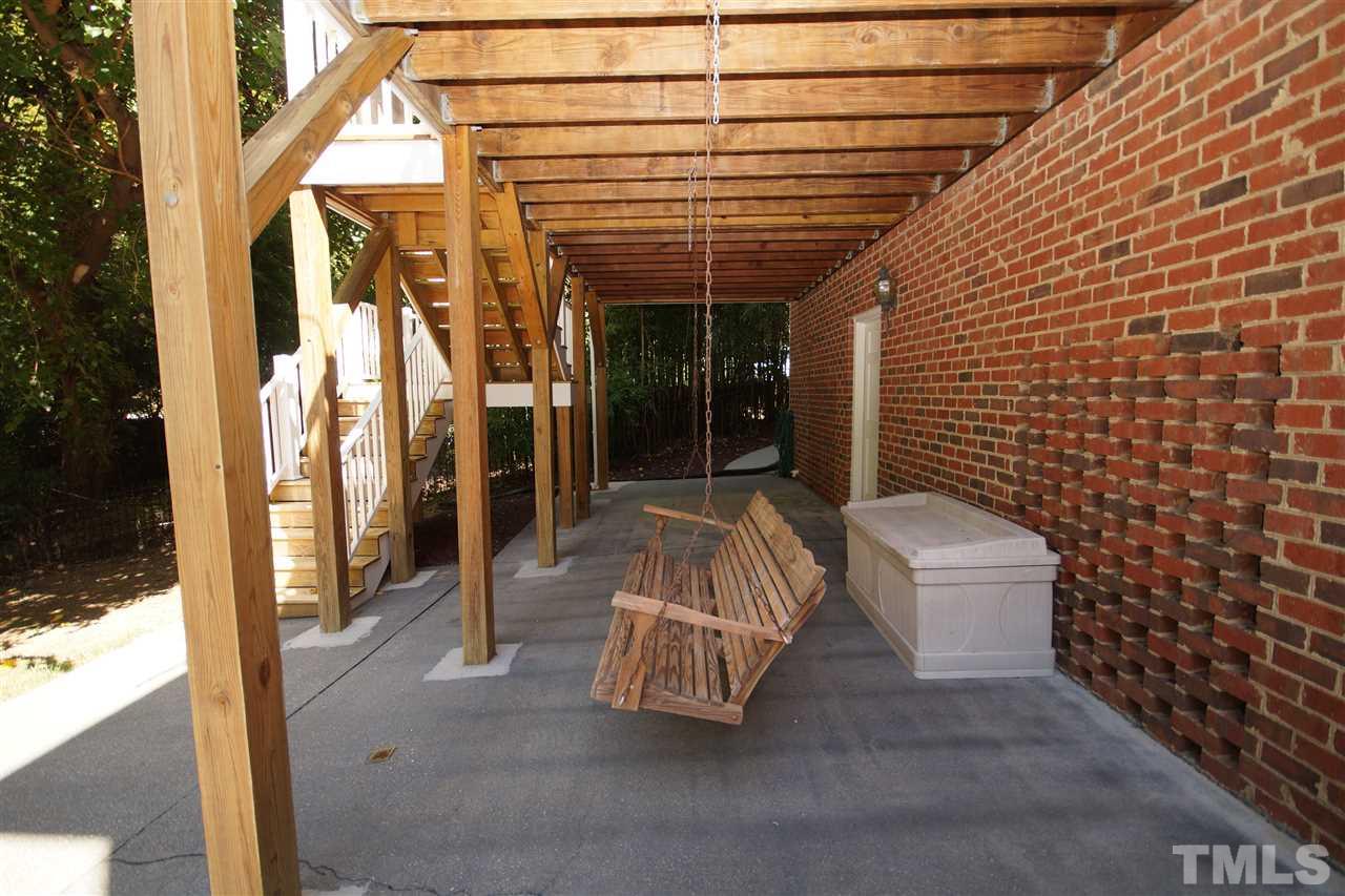 1217 Weldon Place Raleigh, NC 27608 - Photo 24 of 24 a view of an outdoor space with porch and furniture