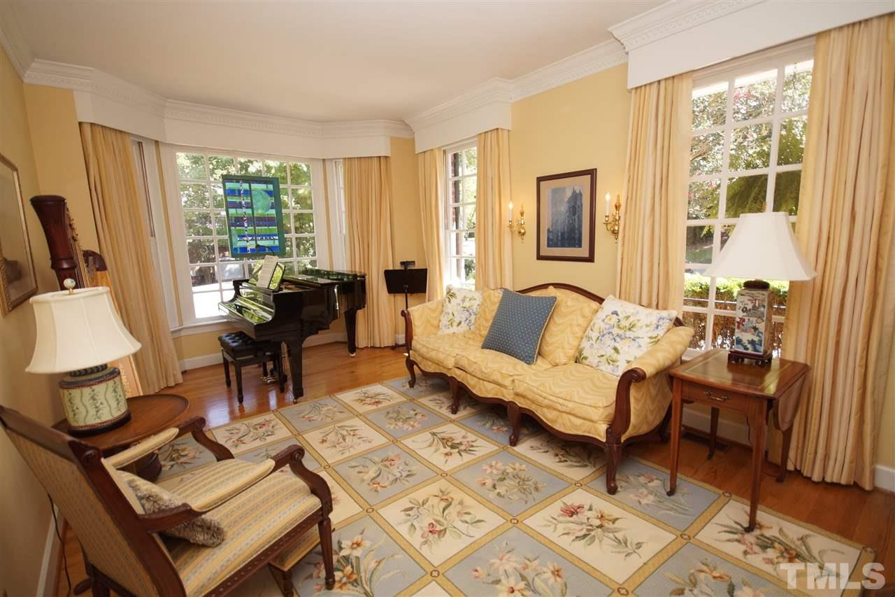 1217 Weldon Place Raleigh, NC 27608 - Photo 5 of 24 a living room with furniture and a window