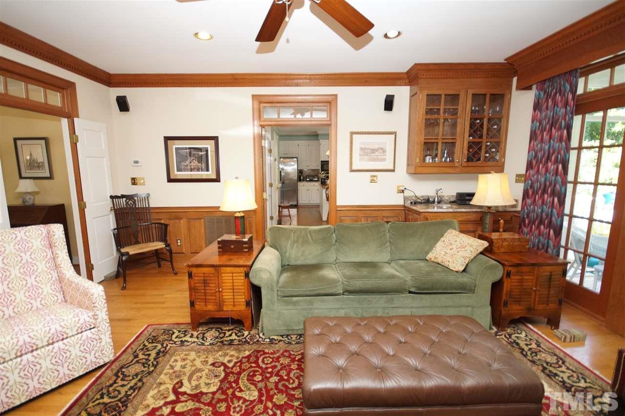 1217 Weldon Place Raleigh, NC 27608 - Photo 7 of 24 a living room with furniture and a couch