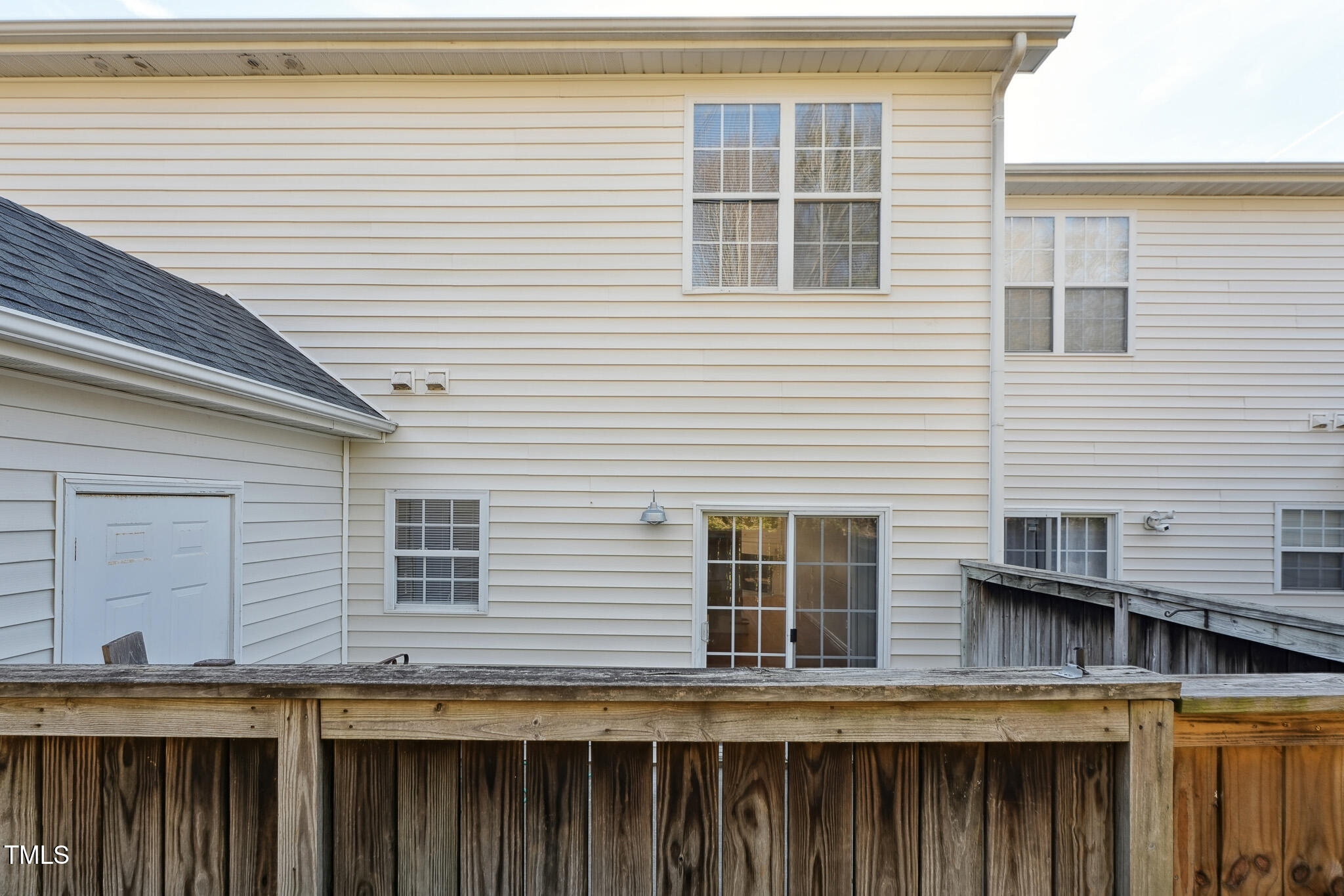 2031 Rivergate Road, Unit 105 Raleigh, NC 27614 - Photo 24 of 29 a view of a house with a balcony