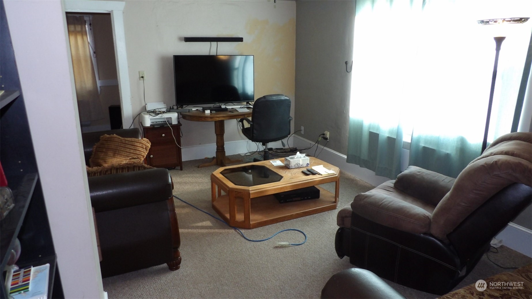 29 East Weber Road Ritzville, WA 99169 - Photo 8 of 20 a living room with furniture and a flat screen tv