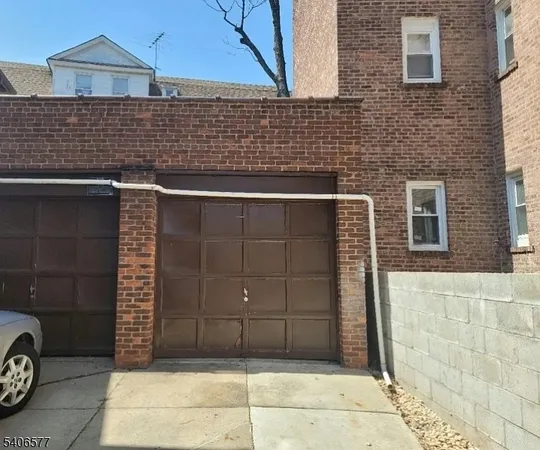 a view of a brick house with a door