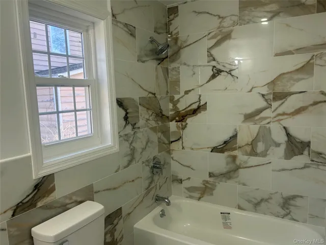 a bathroom with a bathtub