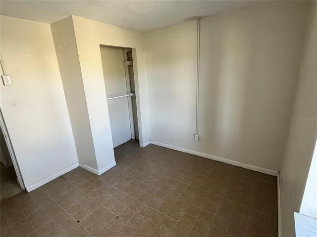 an empty room with a door