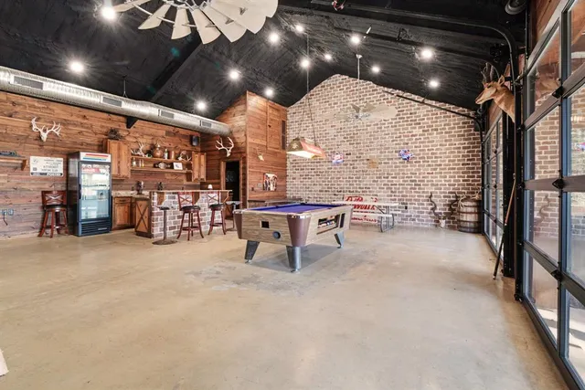a kitchen with a stove and a sink
