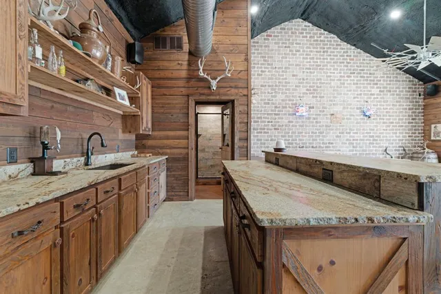 a view of an empty room with stairs