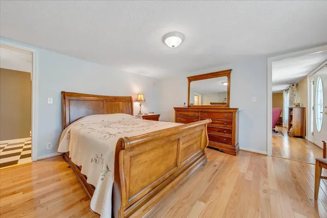 a view of entryway with wooden floor