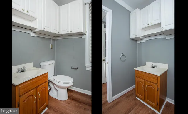 a view of a room with an empty space and window