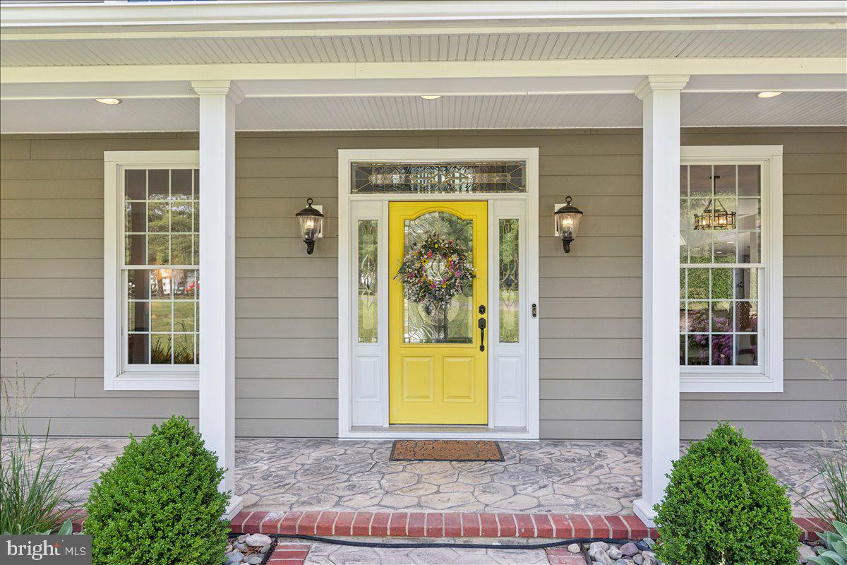 102 Little Neck Road Stevensville, MD 21666 - Photo 68 of 77 a front view of a house with a porch