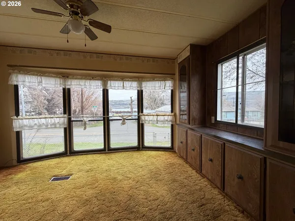 a kitchen with a stove a sink and a refrigerator