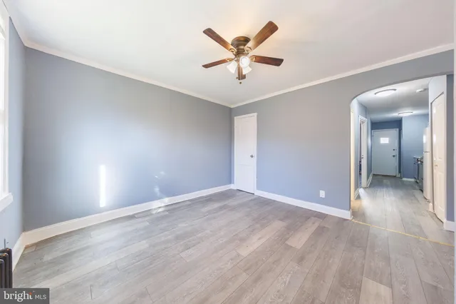 an empty room and window in a room