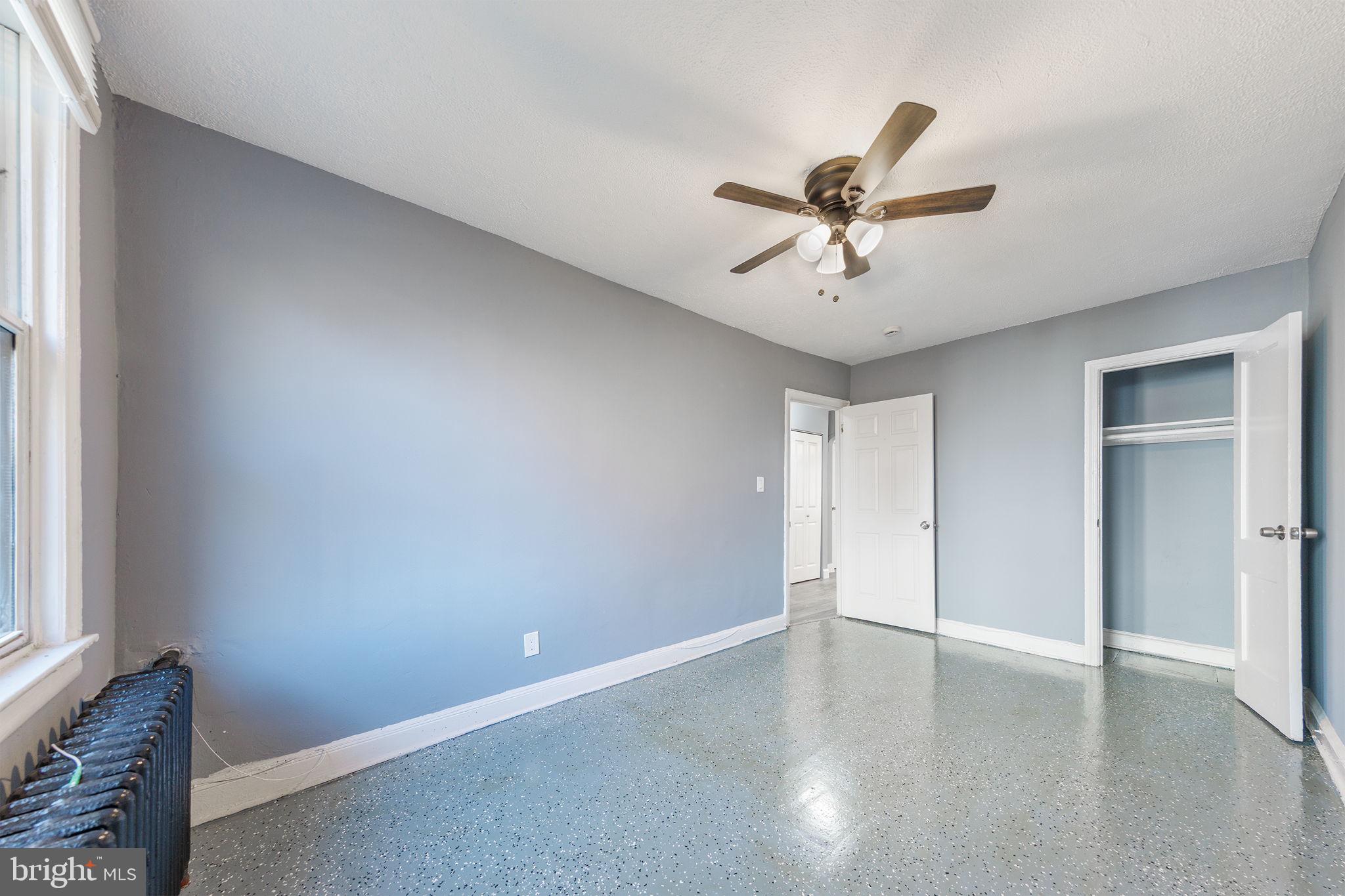 905 19th Street Northeast, Unit 1 Washington, DC 20002 - Photo 12 of 21 wooden floor in an empty room with a window
