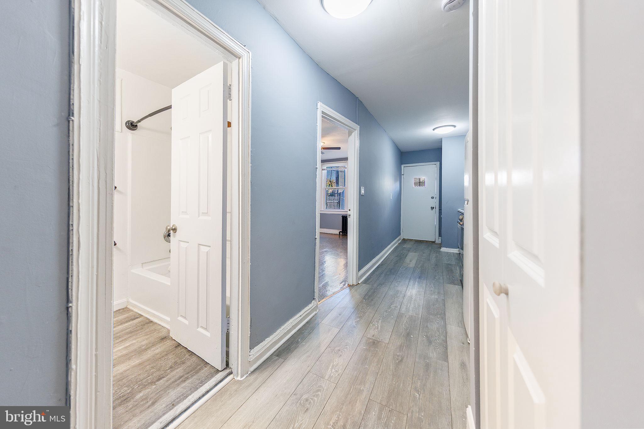 905 19th Street Northeast, Unit 1 Washington, DC 20002 - Photo 13 of 21 a view of a hallway with wooden floor