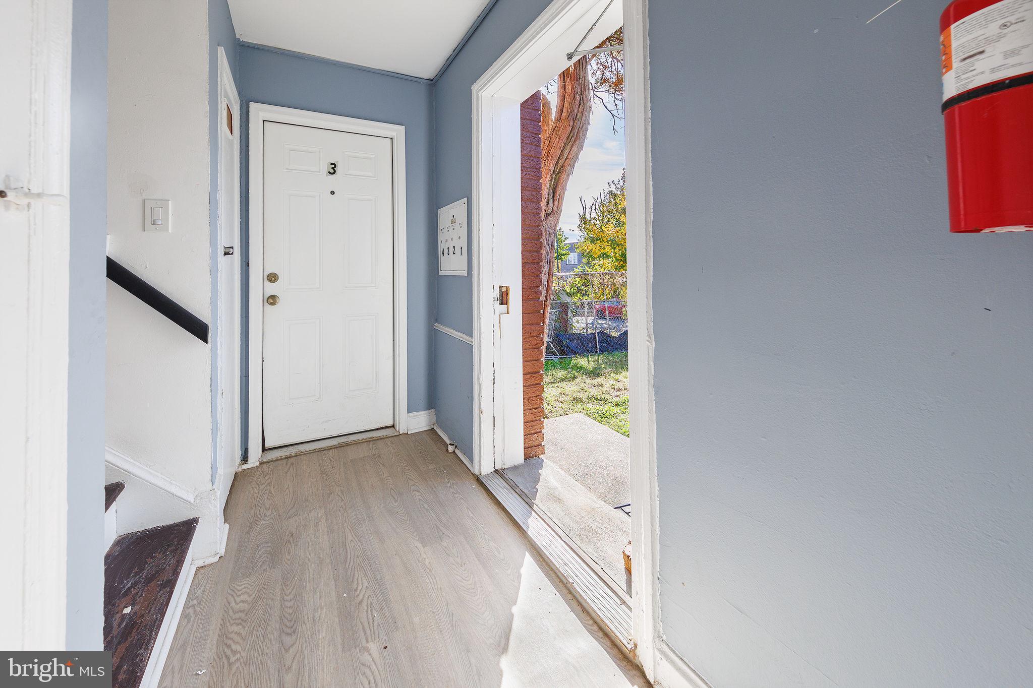 905 19th Street Northeast, Unit 1 Washington, DC 20002 - Photo 15 of 21 a view of hallway with furniture and a window