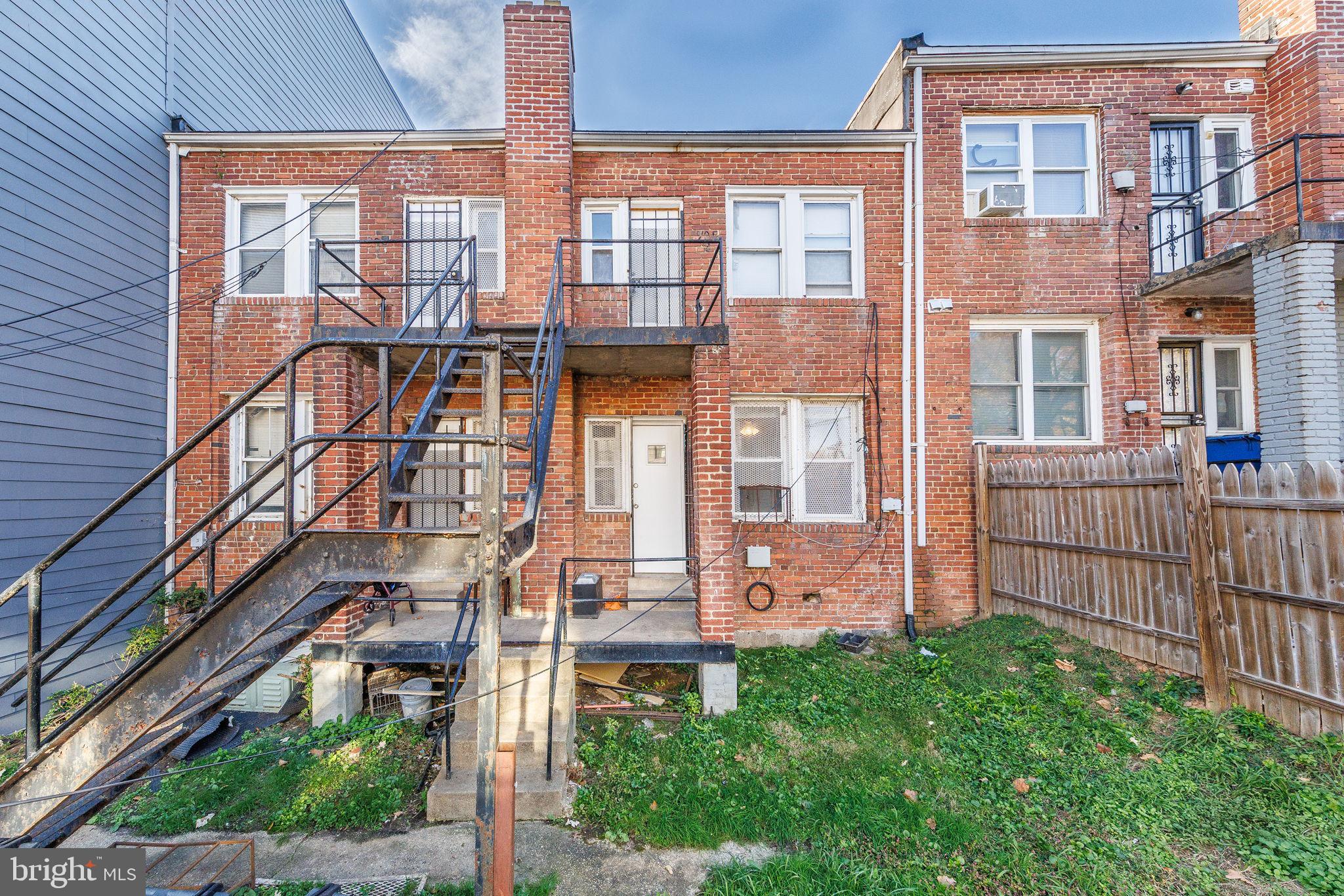 905 19th Street Northeast, Unit 1 Washington, DC 20002 - Photo 16 of 21 a front view of a building with a garden