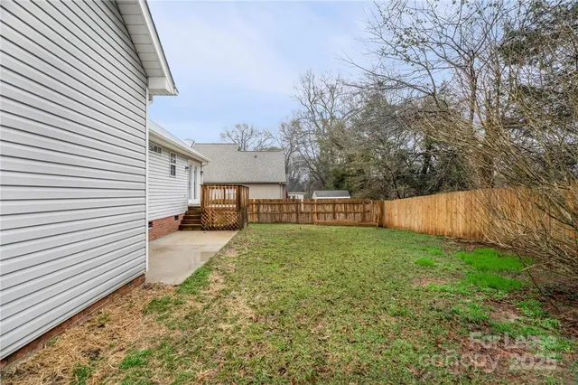 a view of a backyard with a garden
