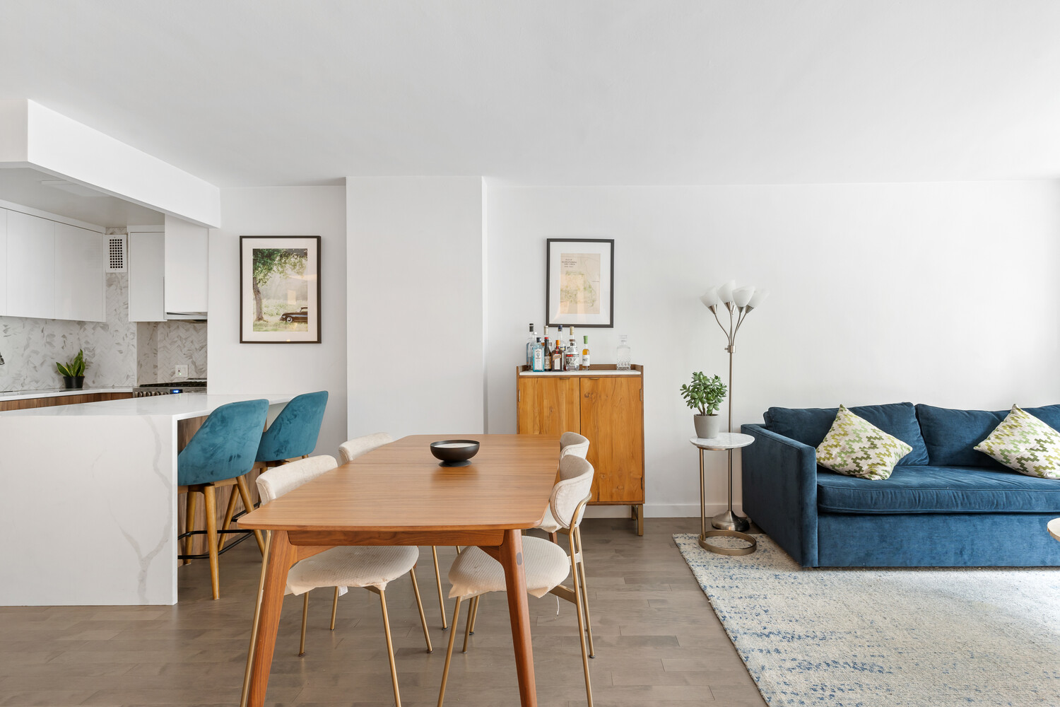 305 East 24th Street, Unit 3B Manhattan, NY 10010 - Photo 4 of 11 a living room with furniture and a table