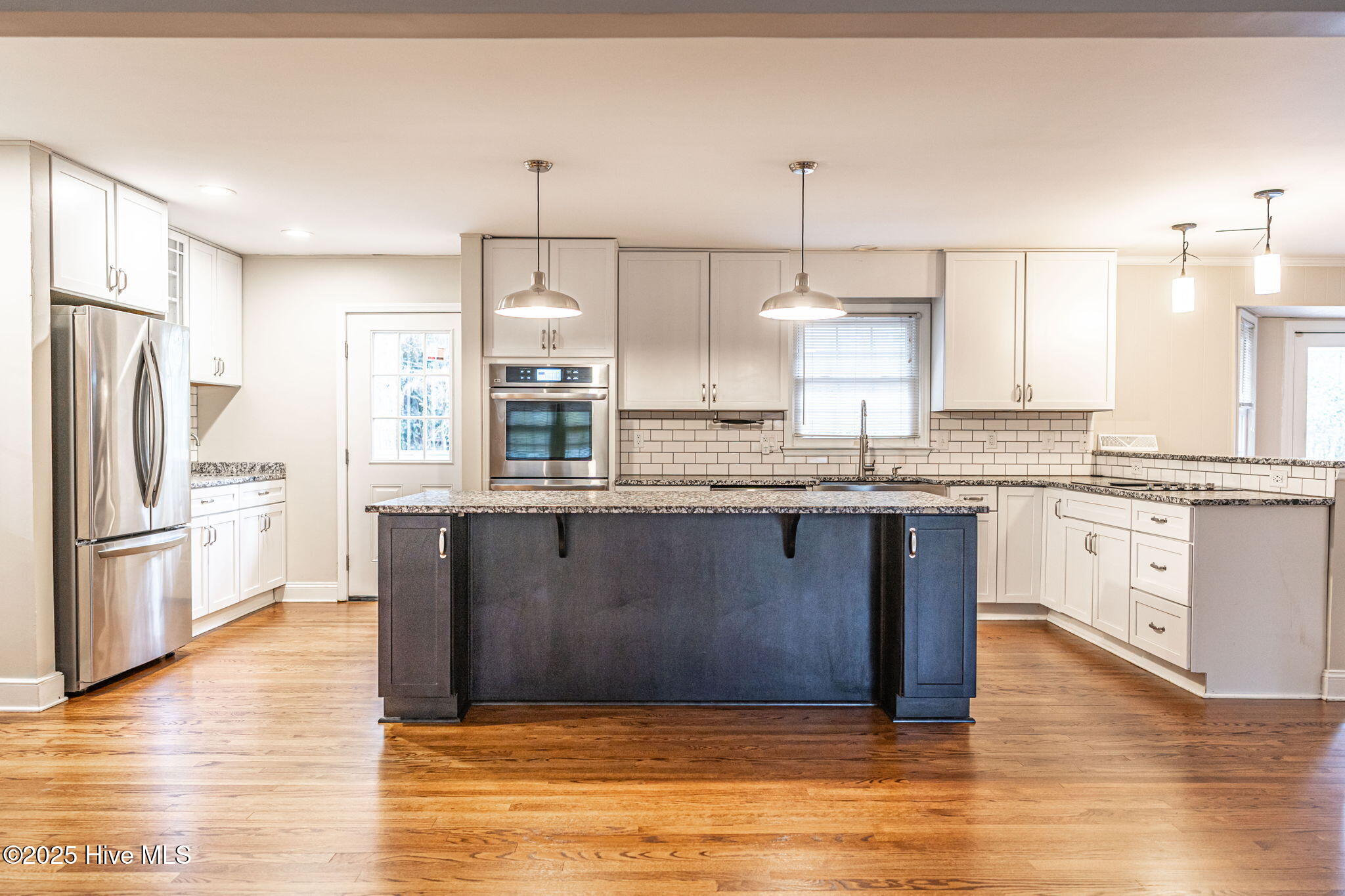 202 Downing Place Southern Pines, NC 28387 - Photo 11 of 32 Kitchen with Stainless Steel Appliances